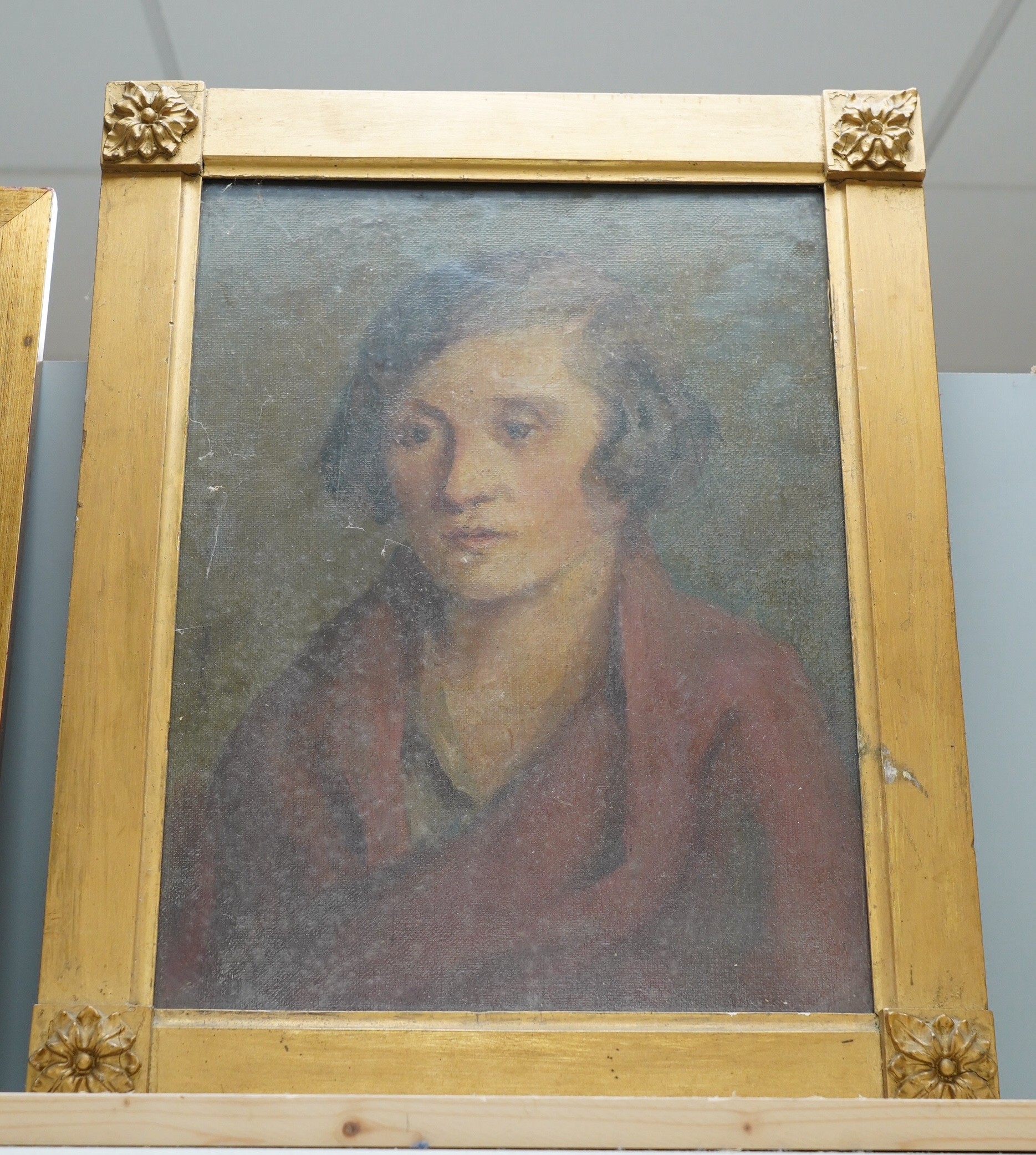 Irish School, oil on canvas, Head and shoulders portrait of a lady, partial Dublin label verso, 38 x 28cm, gilt framed. Condition - fair